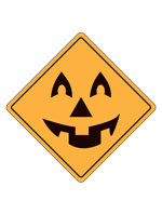 An orange construction diamond with a jack-o'-lantern face
